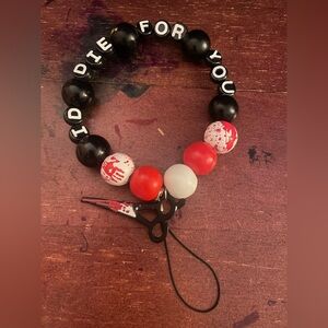 Horror inspired phone wristlet